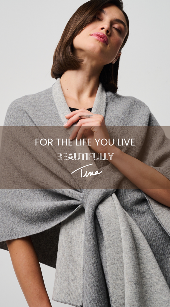 Woman with gray wrap living the life she loves beautifully